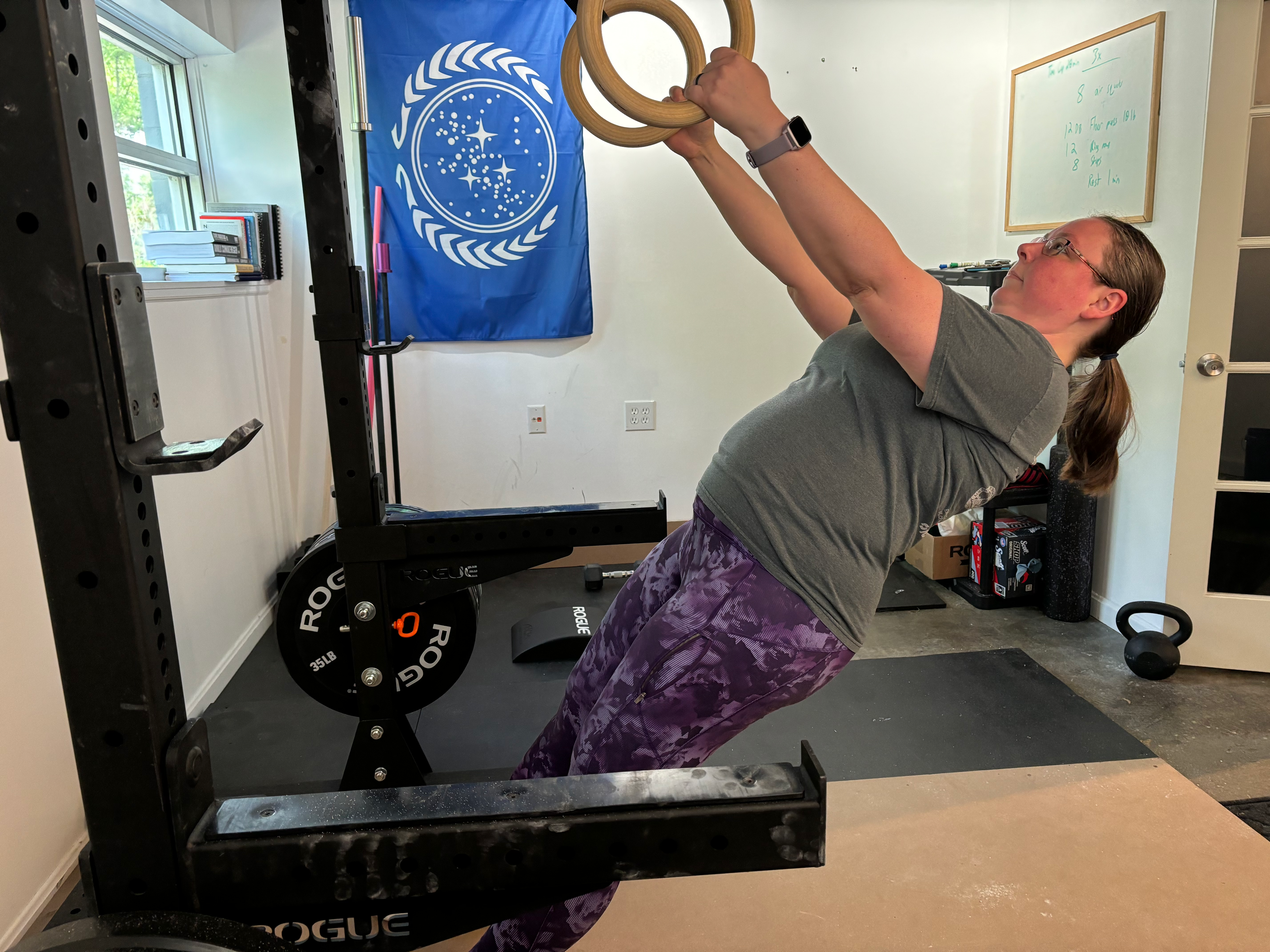 Amber trains the ring row at Gus's Barbell Club